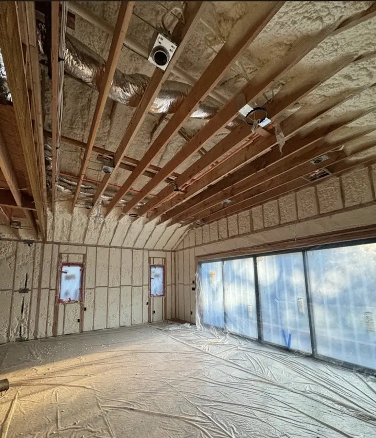 Interior walls and ceiling insulated with spray foam during new construction in DeLand